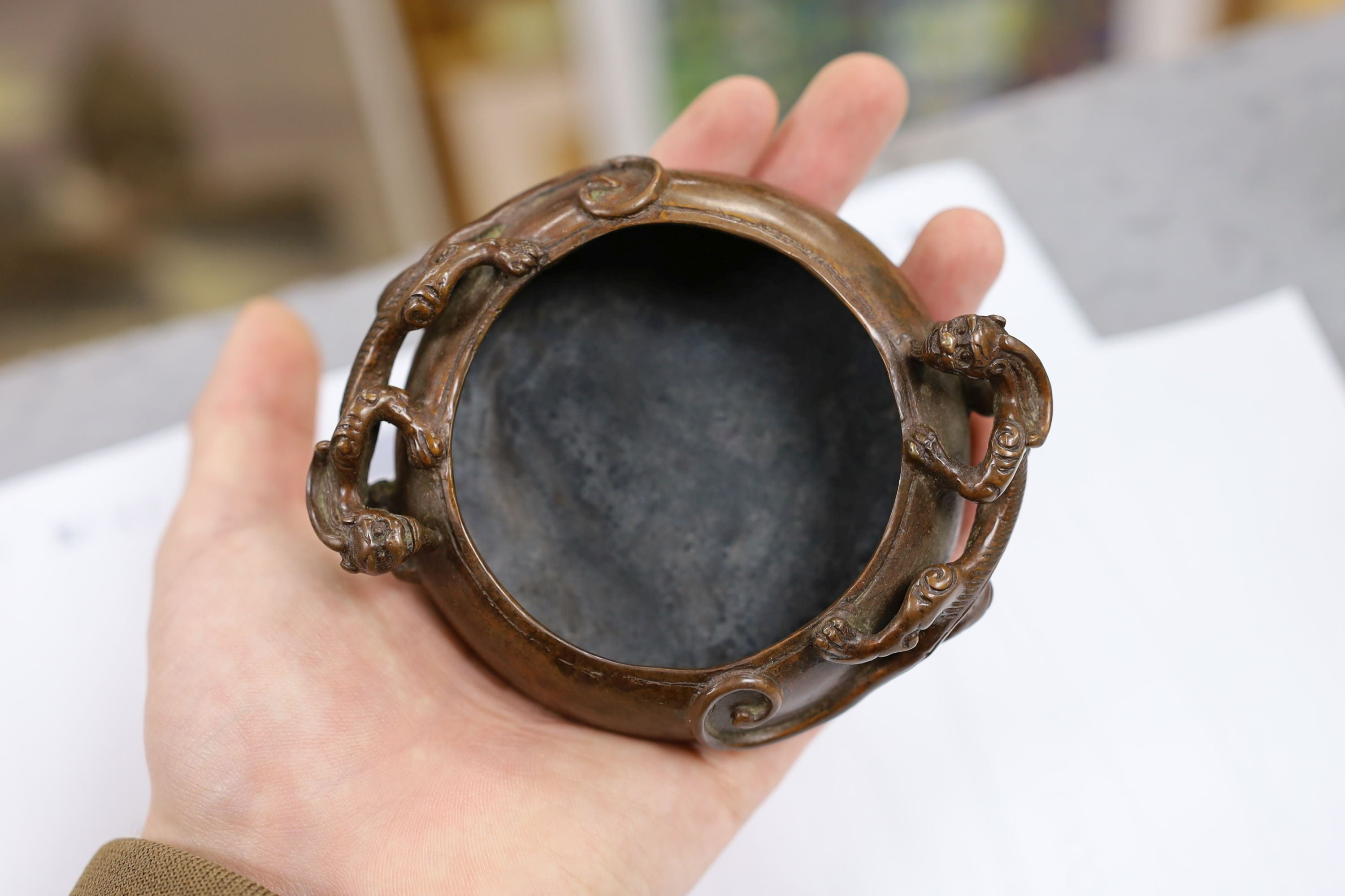 Two Chinese bronze censers, largest 11cms diameter